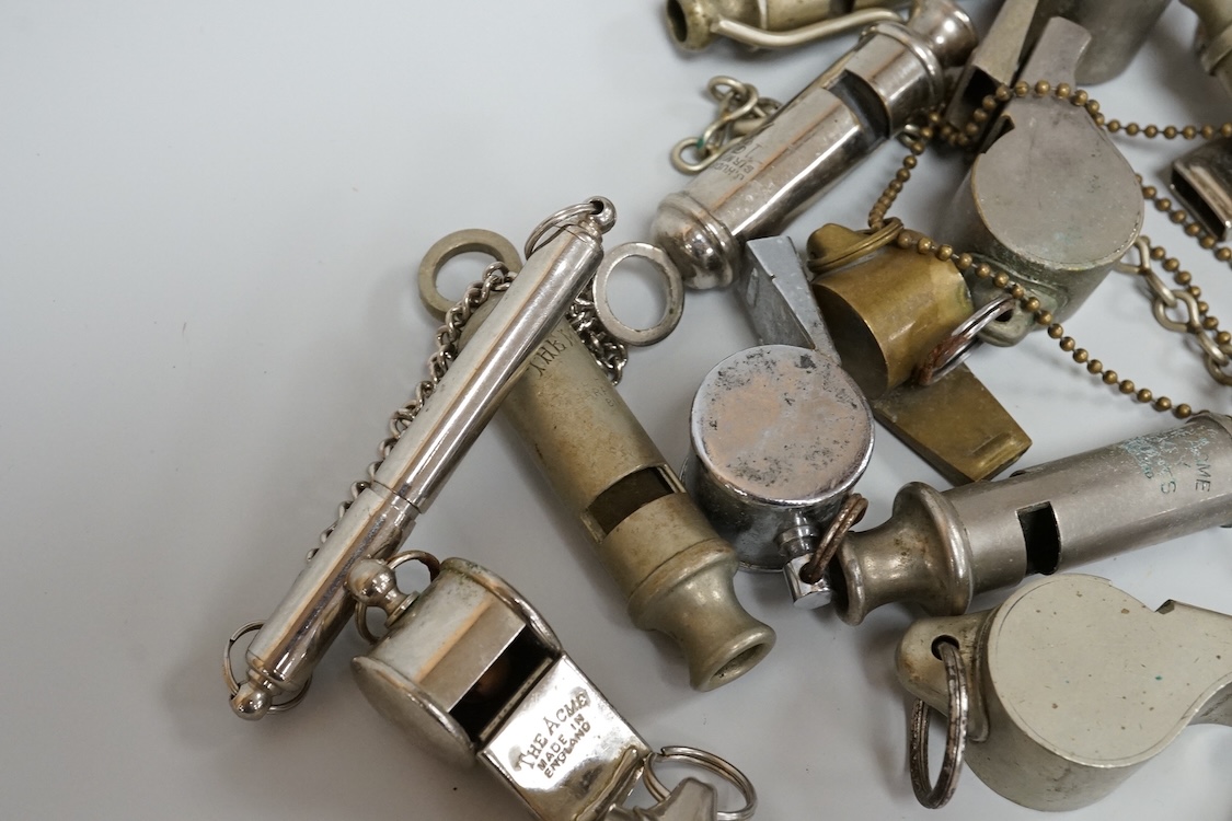 A collection of assorted penknives and whistles